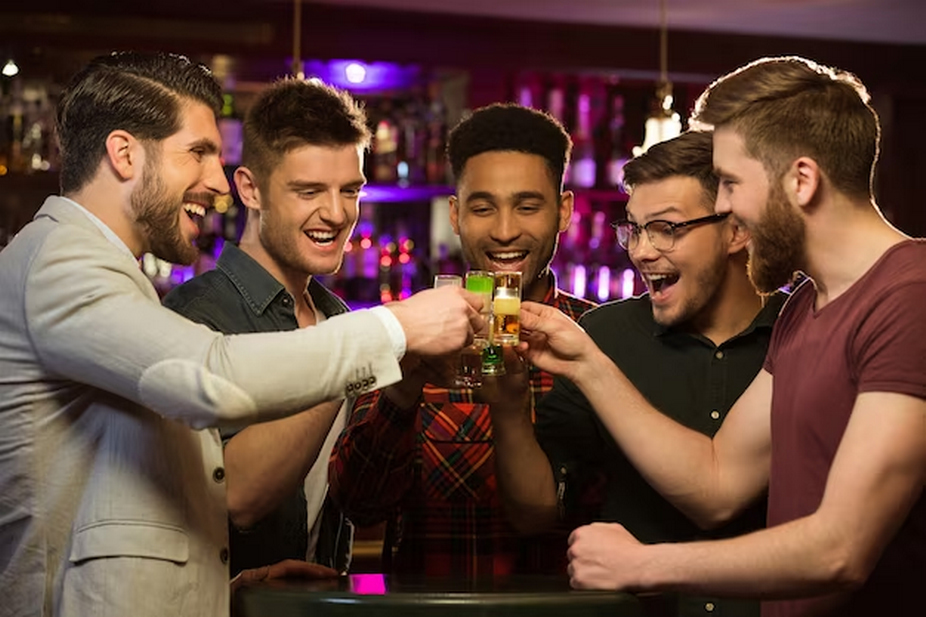 People enjoying drinks at the bar