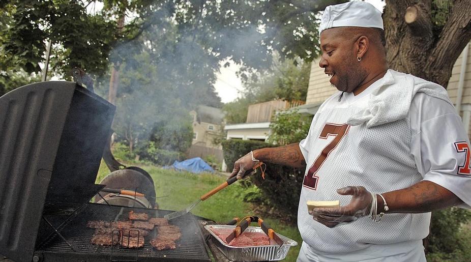 Man cooking food on the grill