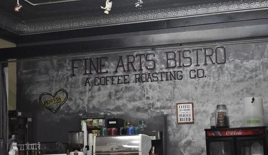 Restaurant logo on a stone wall